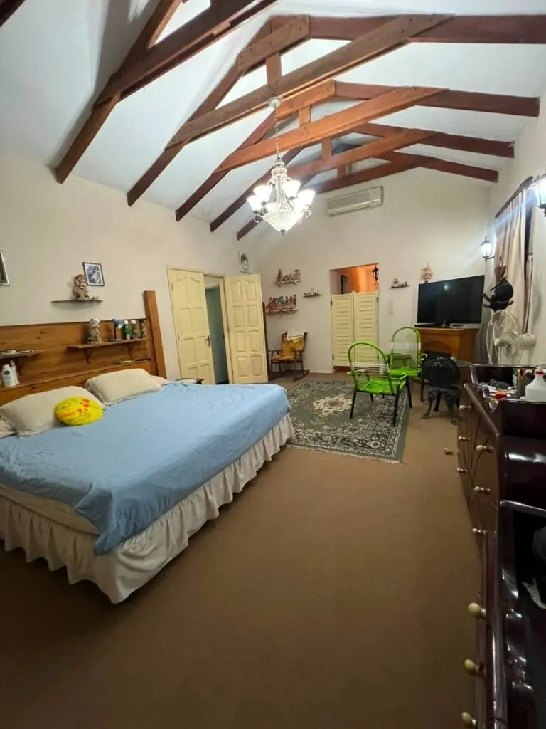 Casa quinta con terreno de 3.148 m² en venta en el Urubó: foto 14 de 15