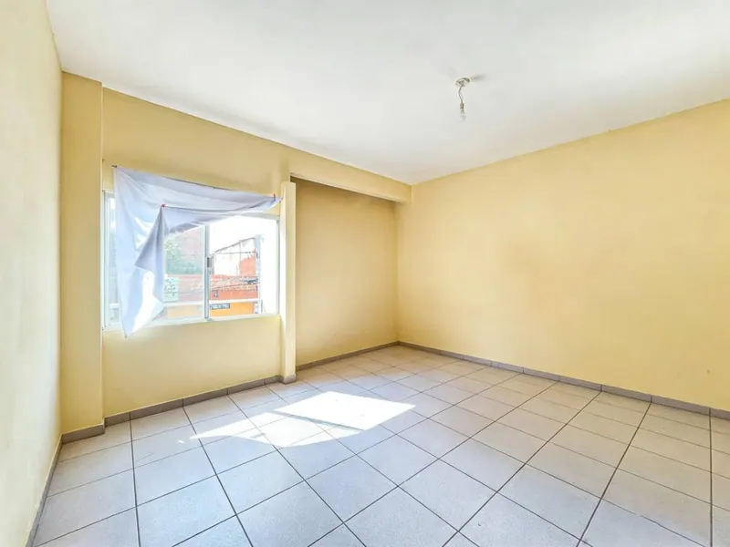 Casa de uso comercial en esquina en venta en la Av. Tarumá, Zona Oeste: foto 9 de 14